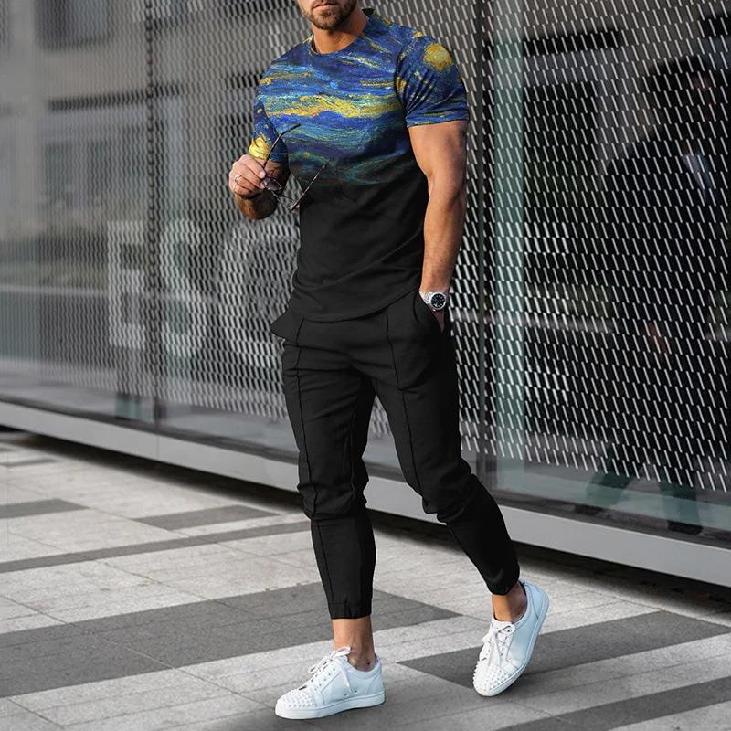 男性のスーツの夏の青年の半袖のtシャツのストライプは色のゆったりした弾力の薄い運動のズボンの2つのセットをつづり合わせます。|undefined