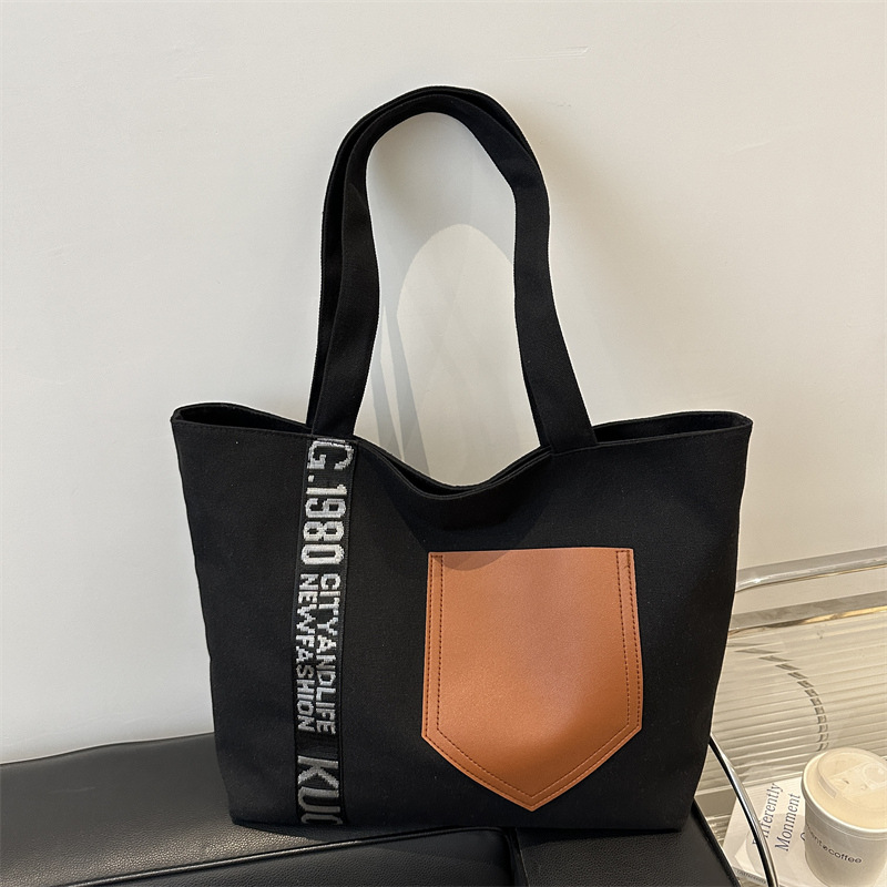 Bolso de mujer 2024 invierno nuevo bolso de gran capacidad de transporte de lona bolso de brazo de moda simple bolso de hombro