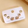 Cute earrings heart-shaped from pearl with letters, jewelry, European style, simple and elegant design, wholesale