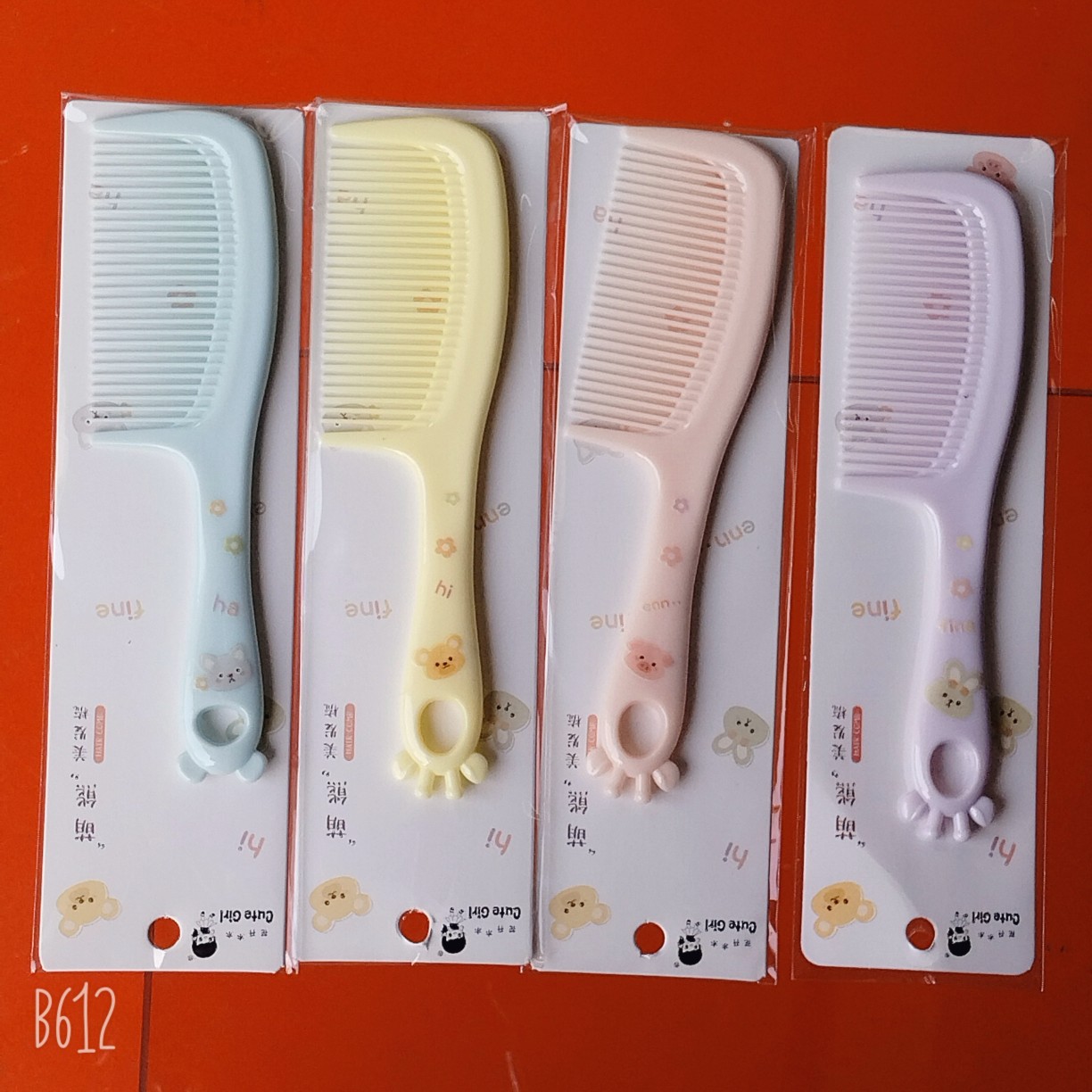 Bonito peine de peinado color macarrón con cojín de aire para masaje, adecuado para uso doméstico y dormitorios estudiantiles, cepillo de pelo de plástico suave con cojín de aire.