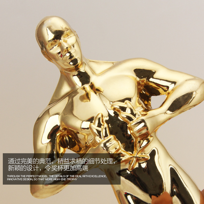 En existencias Oscar pequeño trofeo escuela deportes entrenamiento medalla de plástico Ángel pequeño hombre de oro decoraciones de negocios