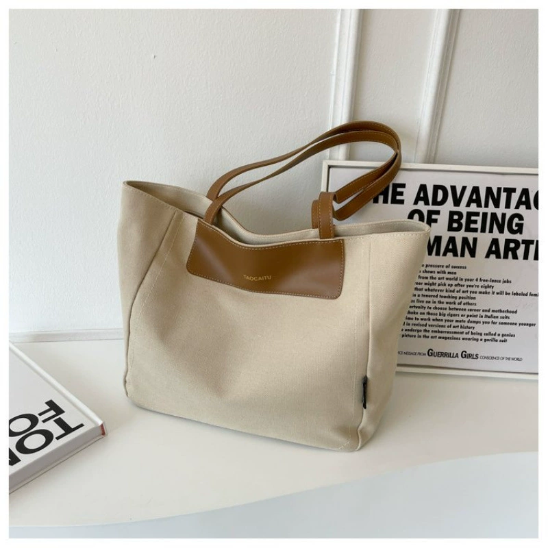 Demi-season universal capacious shoulder bag