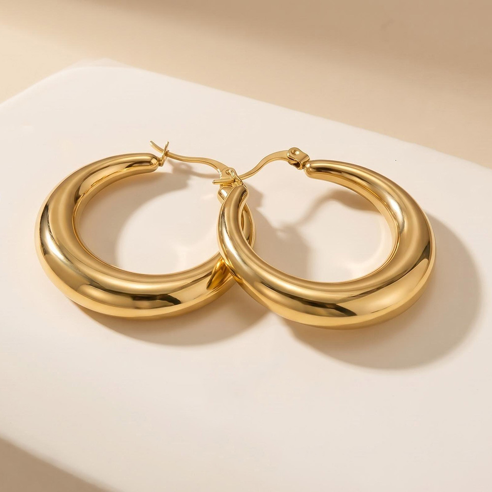 Hot-selling stainless steel hollow earrings for women, electroplated 18K gold round hoop earrings, non-fading ear clasps, wholesale from manufacturer