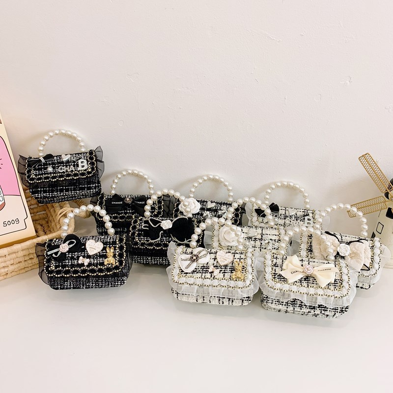 Mini-moletera de perlas de moda para niñas 2025, nueva moda coreana a cuadrillas, bolsos para niñas, ropa para niños