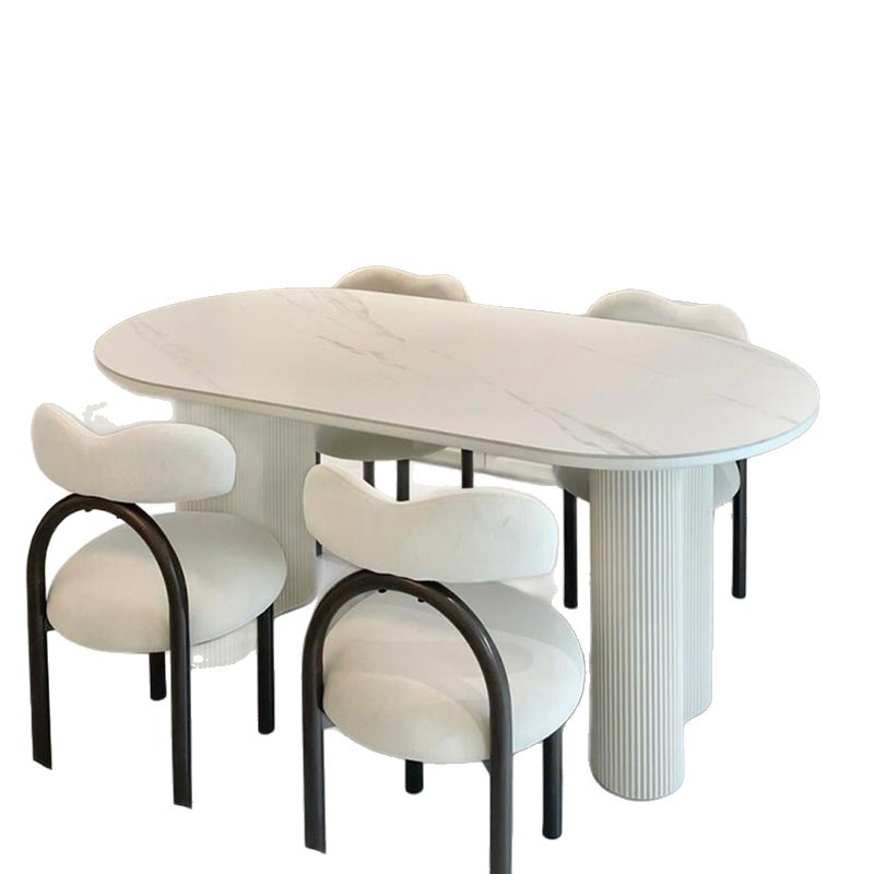 Mesa de comedor ovalada de roca francesa lujosa crema de lujo ligera de alta gama moderna y simple columna de cacahuete silla de viento silencioso combinación de mesa de comedor