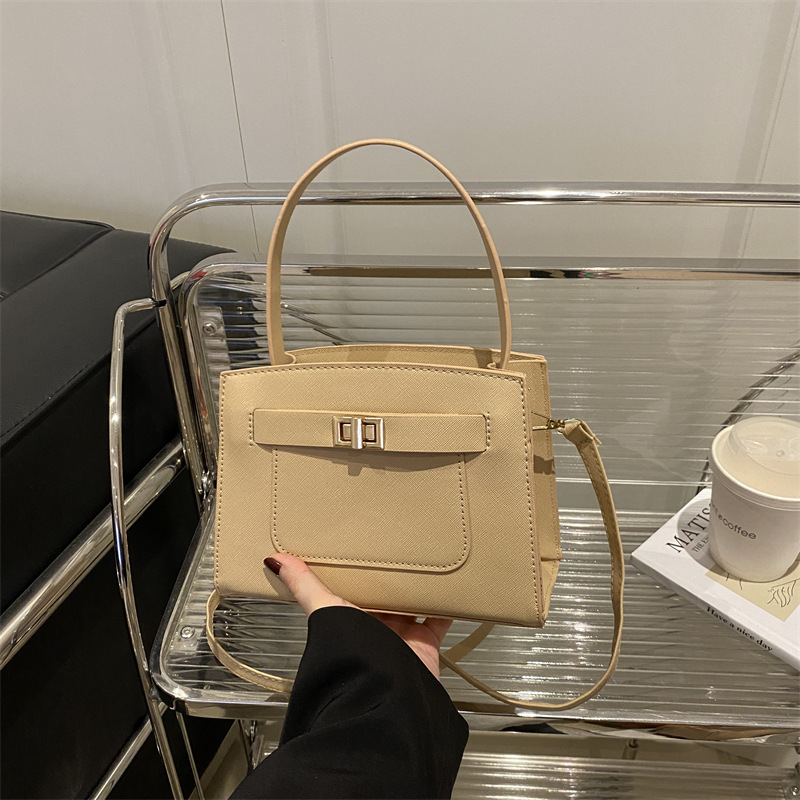 Bolso de mujer 2025 primavera nuevo bolso de mensajero de un solo hombro atmosférico de nicho simple de moda bolso de alta capacidad para mujer