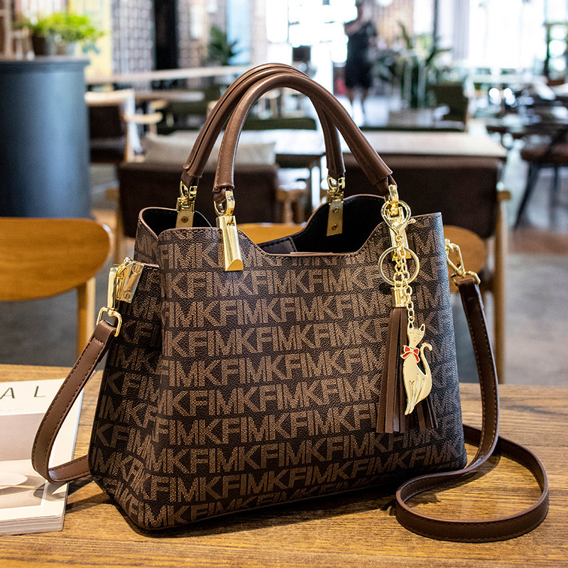 Hong Kong Genuine Leather Women's Bag with a Light Luxury Feel, Tote Bag, 2026 New Trendy Printed Women's Shoulder Crossbody Handbag Hong Kong Genuine Leather Women's Bag with a Light Luxury Feel, Tote Bag, 2026 New Trendy Printed Women's Shoulder Crossbody Handbag