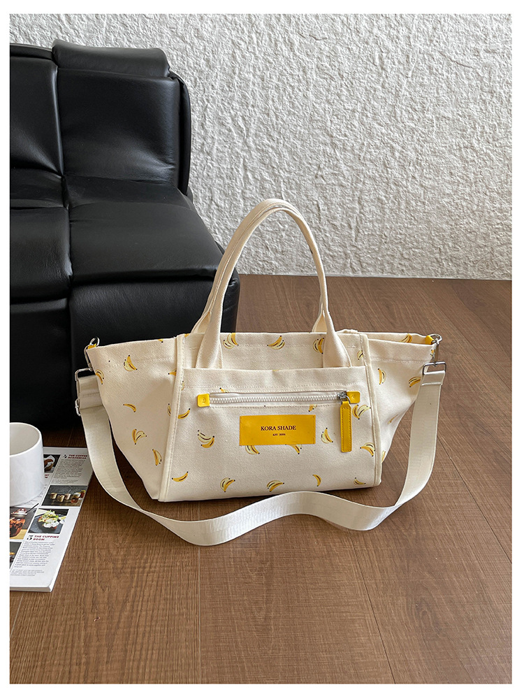 Bolso de lona de gran capacidad para mujeres 2026 nuevo tipo de mochila de hombro simple y casual para la clase de la bolsa de viaje