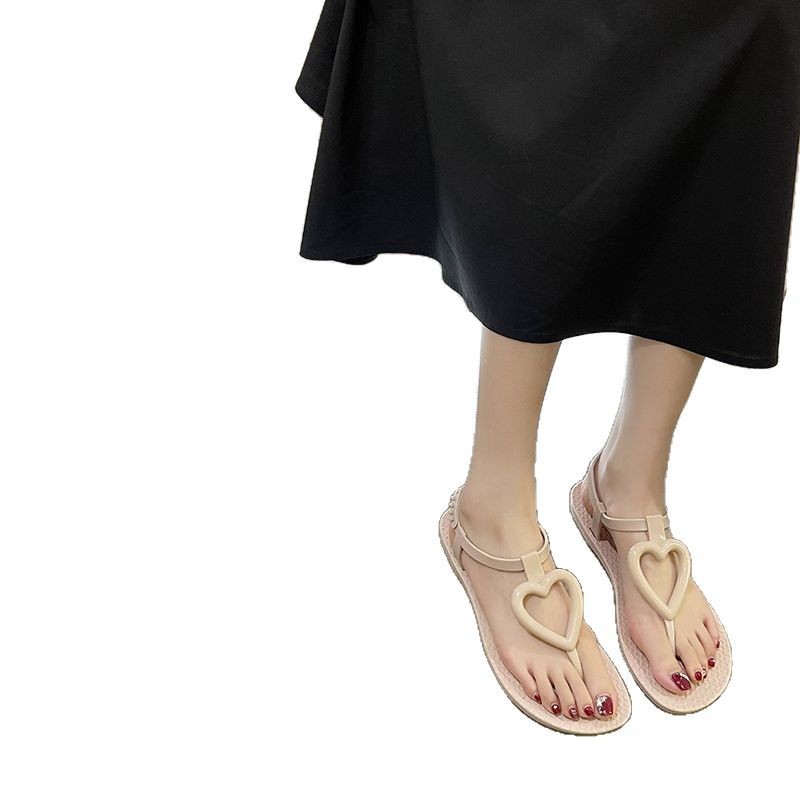 Sandalias planas con chanclas de verano para mujeres francesas 2020 nuevas sandalias coreanas en espina zapatos de playa romanos de todo fósforo para mujeres