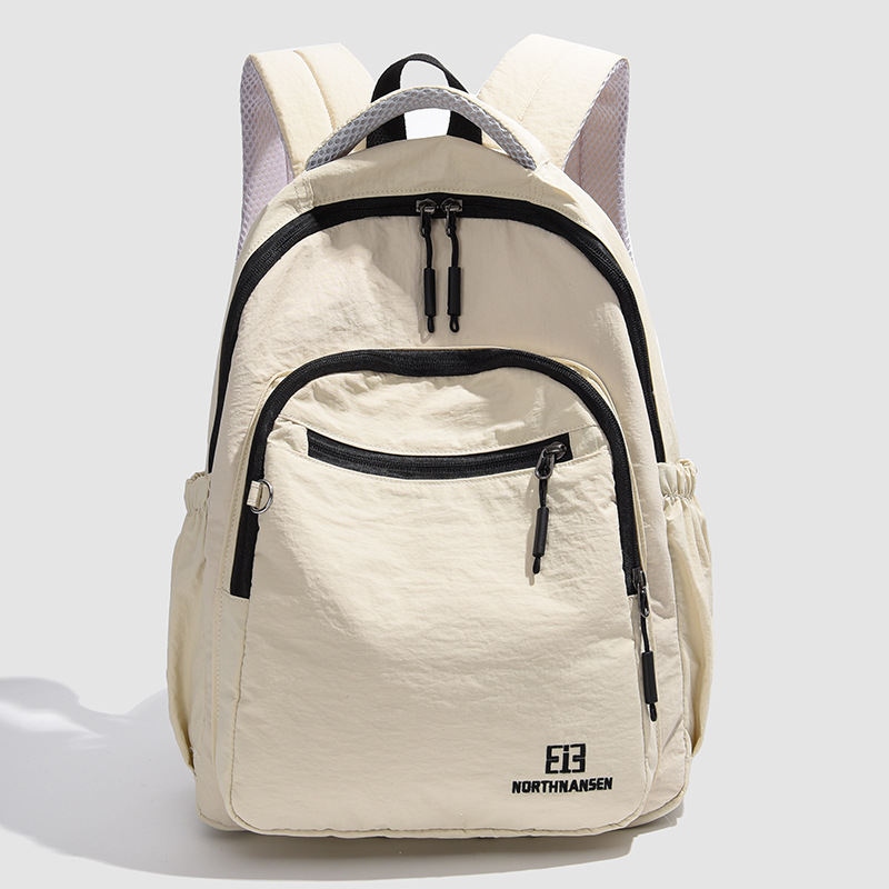 Nueva mochila coreana fresca mochila de estudiantes de género masculino gran capacidad mochila de viaje casual simple y ligera