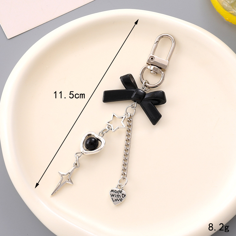 Ins nuevo arco acrílico llavero colgante personalidad DIY bolso colgante auriculares colgante joyas