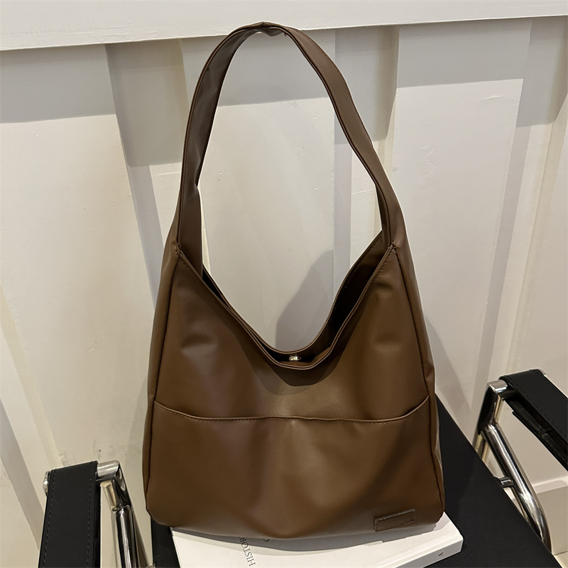 2024 nuevo estilo de moda extranjero estampado leopardo de gran capacidad bolsa de tote personalidad casual perezosa estilo de hombro bolso axilar