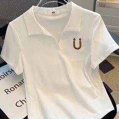 40本のねじの大きいサイズの婦人服poloのシャツは襟をめくって太っています。