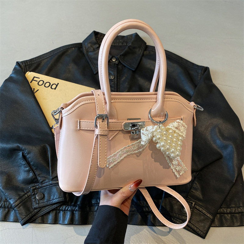 Bolso de concha de moda de verano transfronterizo para mujer 2025 nuevo bolso de hombro de estilo occidental de todo fósforo bolso de mensajero de moda de alta gama