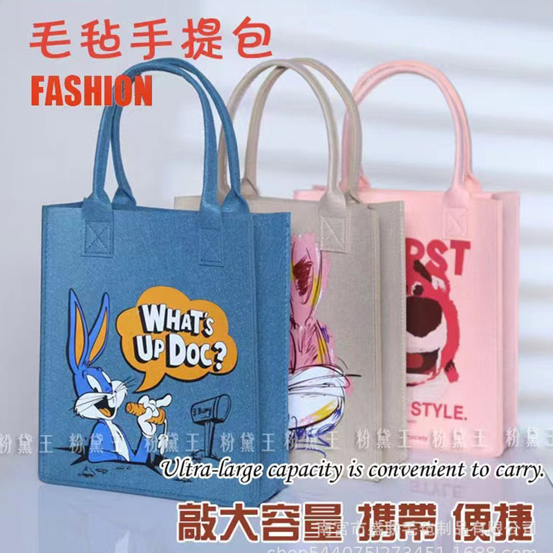 新しいキャラクターのプリントフェルトのハンドバッグとプレゼントの袋の軽い贅沢な簡単な出勤のショッピングバッグ|undefined