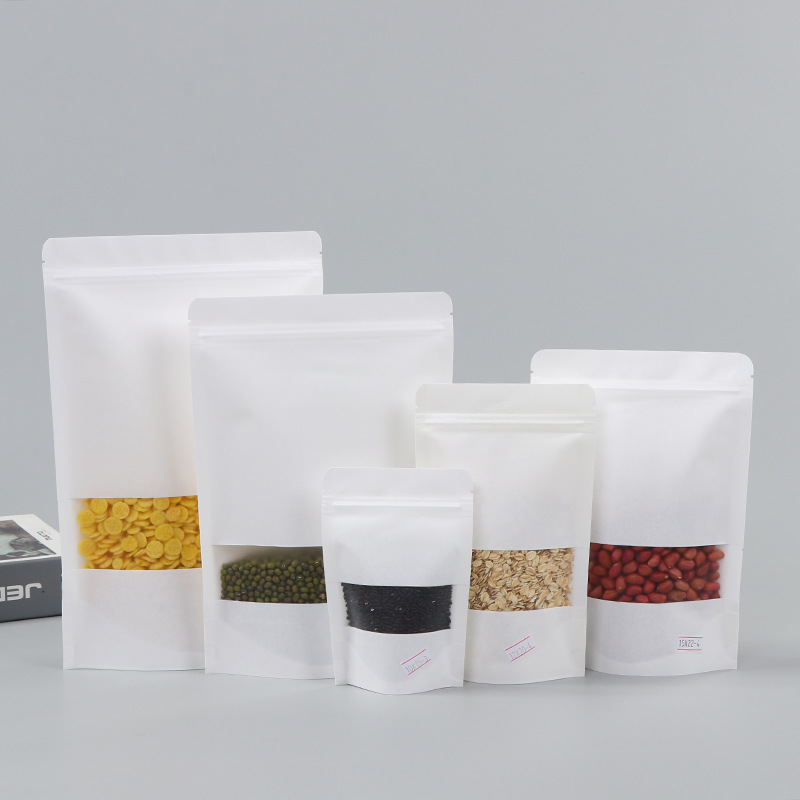 Spot bolsa de papel kraft con ventana transparente bolsa de embalaje de alimentos autosellada autoportante bolsa de té sellada de ocho lados fácil de rasgar