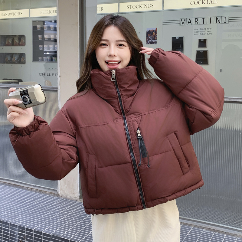 Capa de algodón de pluma corta de invierno de mujeres inins coreano engrosado vestido de pan de diseño sensación de nicho abrigo de algodón de moda
