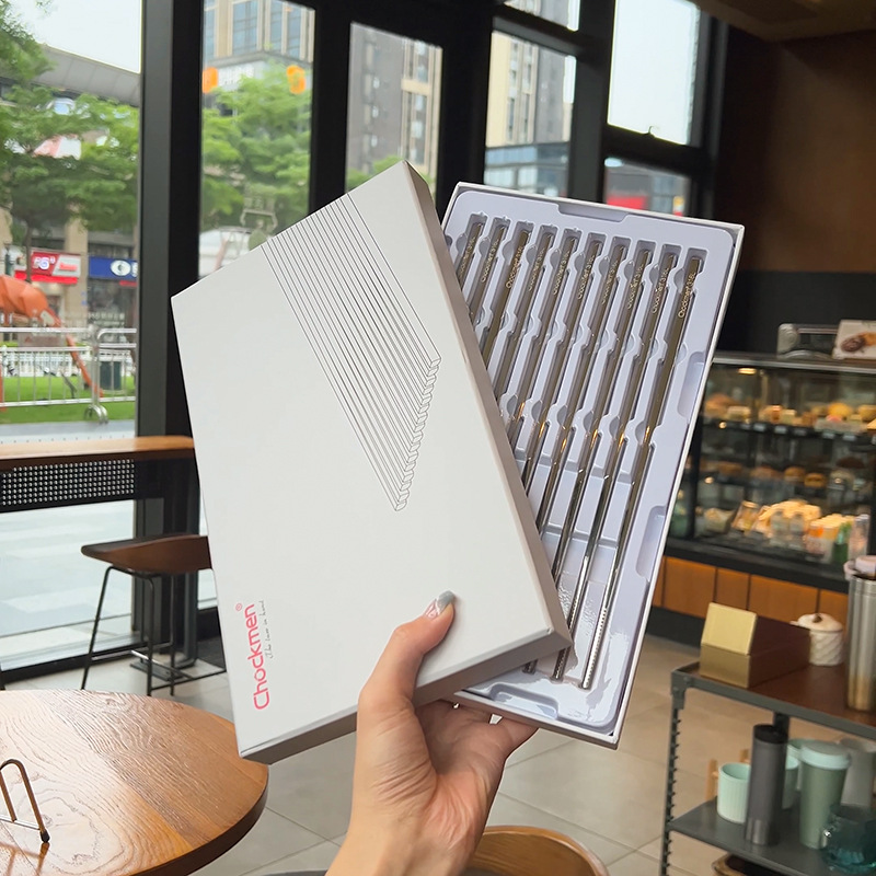 Chockmen Zhuo Deming Jingying serie 316L de acero inoxidable antideslizante palillos del hogar caja de regalo 10 pares