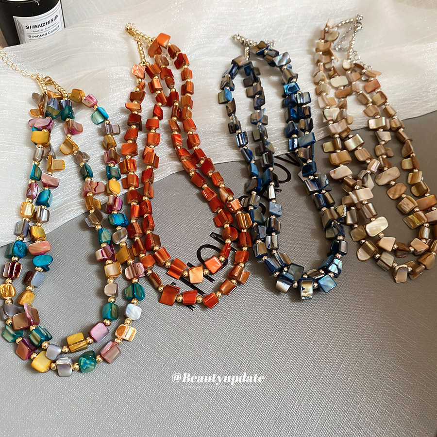 Collar con cuentas de concha de color irregular de verano Cadena de clavícula salvaje retro europea y americana