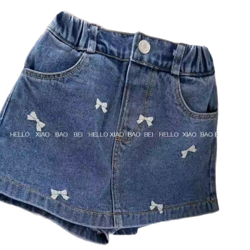 Qian Qi ropa infantil nueva falda de mitad de verano niñas bordadas con arco lavado con agua vaquero estilo extranjero A falda de mitad de mitad de mitad