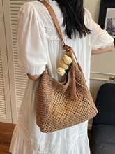 时尚气质挂坠编织包百搭镂空休闲草编包沙滩包单肩女士包草编特色