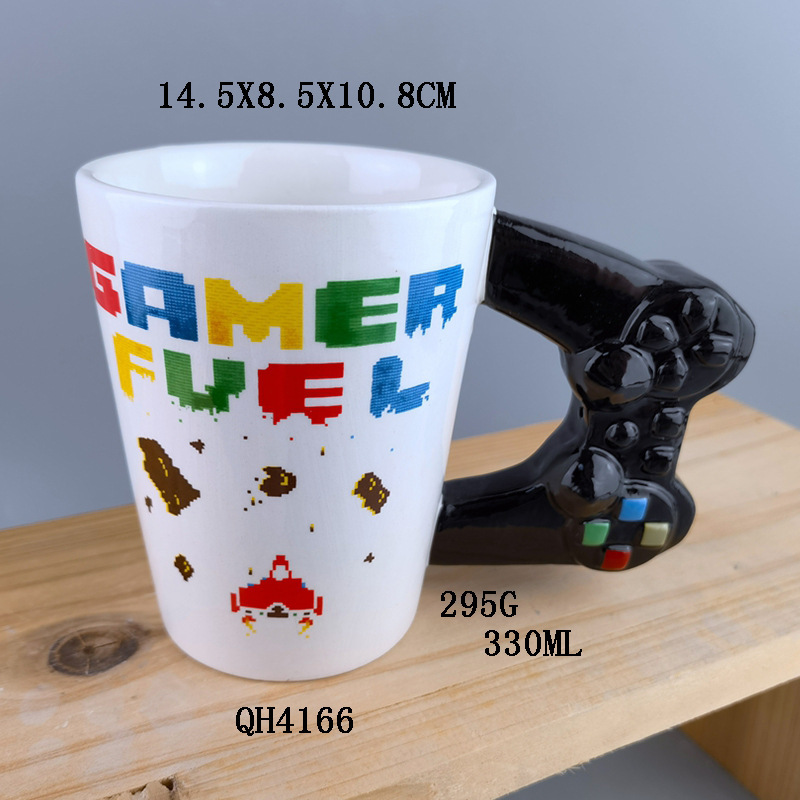 Mango de juego creativo taza de cerámica máquina de juego de letras de color balancín taza de agua de cerámica taza de café de dibujos animados