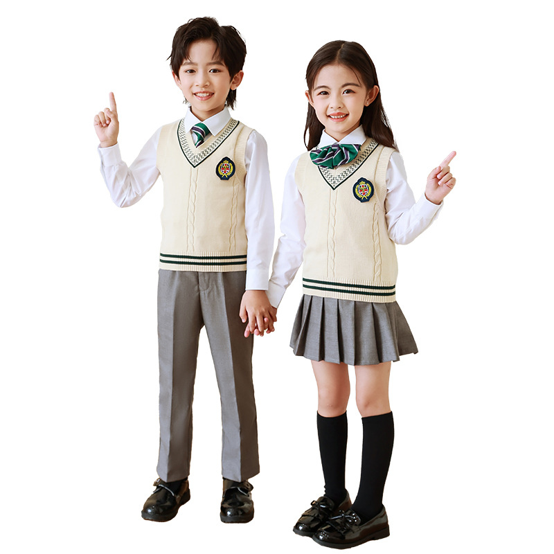 Uniforme escolar para estudiantes de primaria traje de primavera y otoño ropa deportiva de clase para niños primavera y verano jardín de infantes de cuatro piezas Ropa de jardín otoño algodón puro
