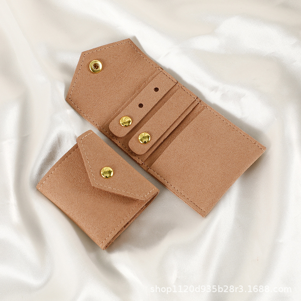 Spot microfibra portátil multifuncional mini joyería rollo de joyería pendiente anillo pendiente collar bolsa de protección de almacenamiento