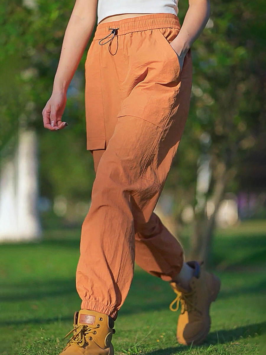 Fábrica directa de pantalones secos rápidos para hombres y mujeres de verano nuevos pantalones ligeros y transpirables parejas sueltos de pies deportivos casuales de nueve puntos