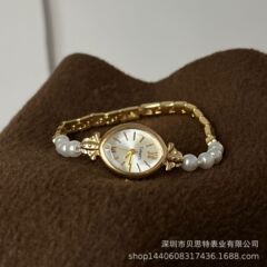 大衆ファッション気質天然淡水真珠時計中古風手鎖式バンド軽贅沢石英女性時計