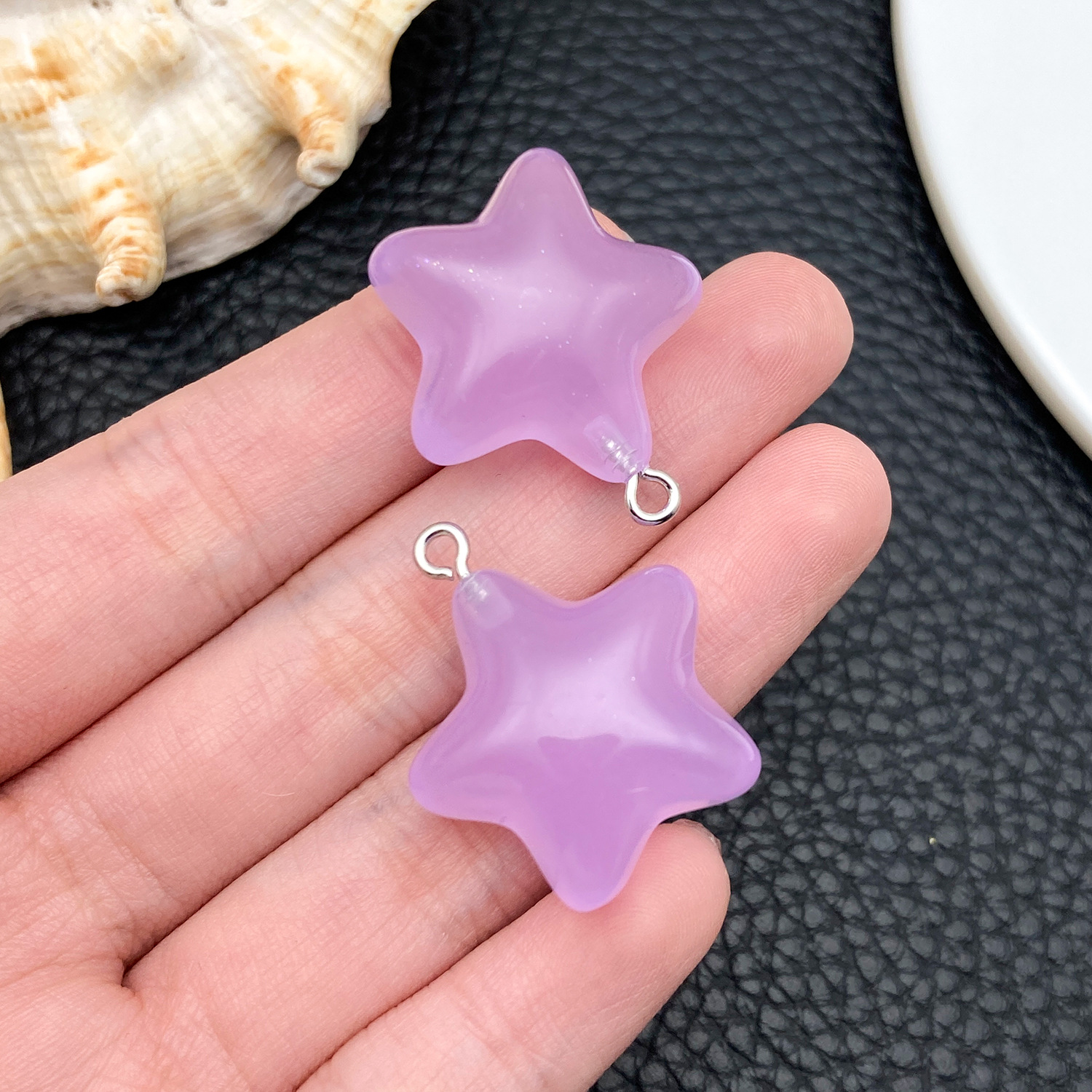 24061-H-紫色树脂夜光星星27x23x13mm-3.5