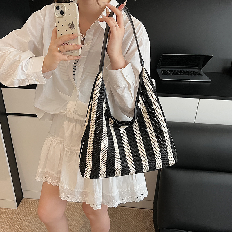 Bolso Tote de moda coreana 2025 nuevo bolso de mujer tejido casual bolso de estilo perezoso bolso de hombro a rayas en contraste