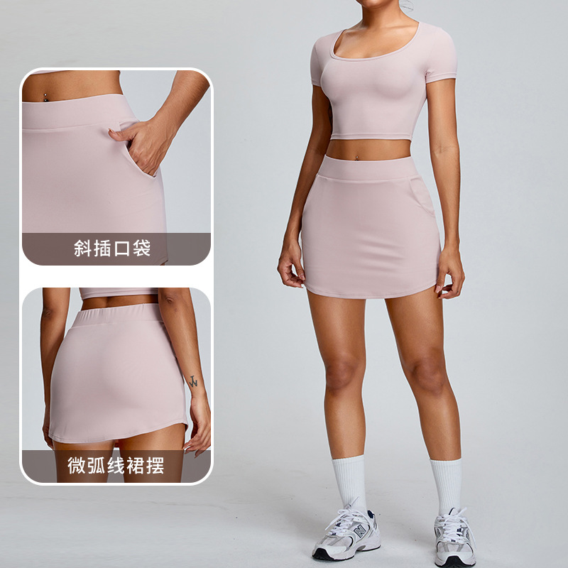 Primavera y verano nueva línea de moda deportes falda slim fit todo partido anti-exposición cadera falda al aire libre casual tenis culottes