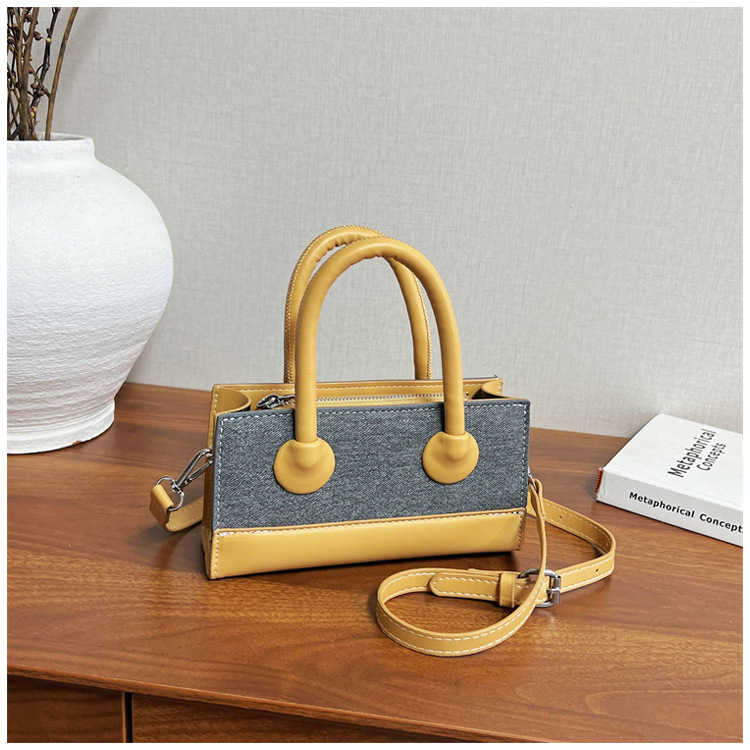 Bolso de mano de alta sensación para mujeres 2026 nuevo color de moda bolso de empalme pequeño bolso de hombro de lujo pequeño bolso image 13