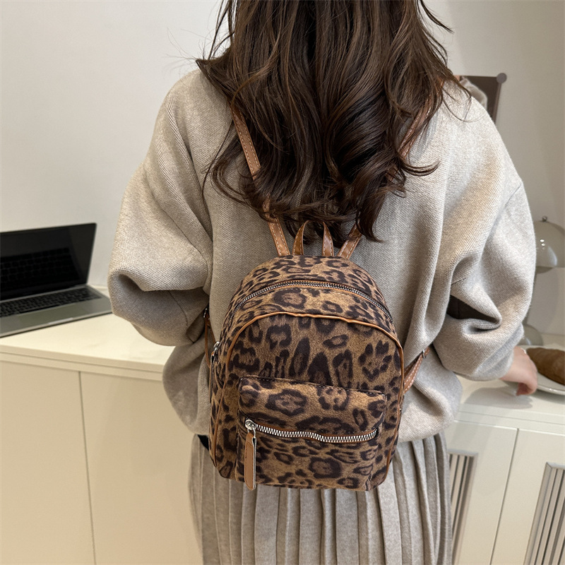 Mochila retro leopardo para mujeres 2025 nueva moda versátil mochila de estudiantes otoño sensación de alto nivel bolso de mano ocio