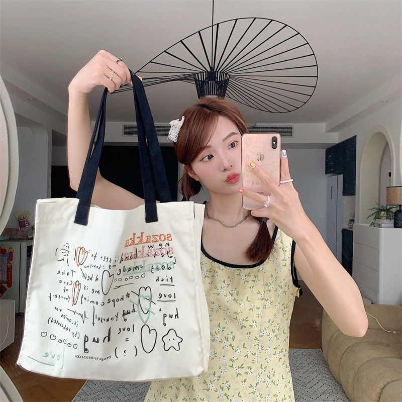 36273 Japanese and Korean canvas bag for women, versatile large-capacity embroidered and printed hand-held shoulder bag, student class bag undefined
