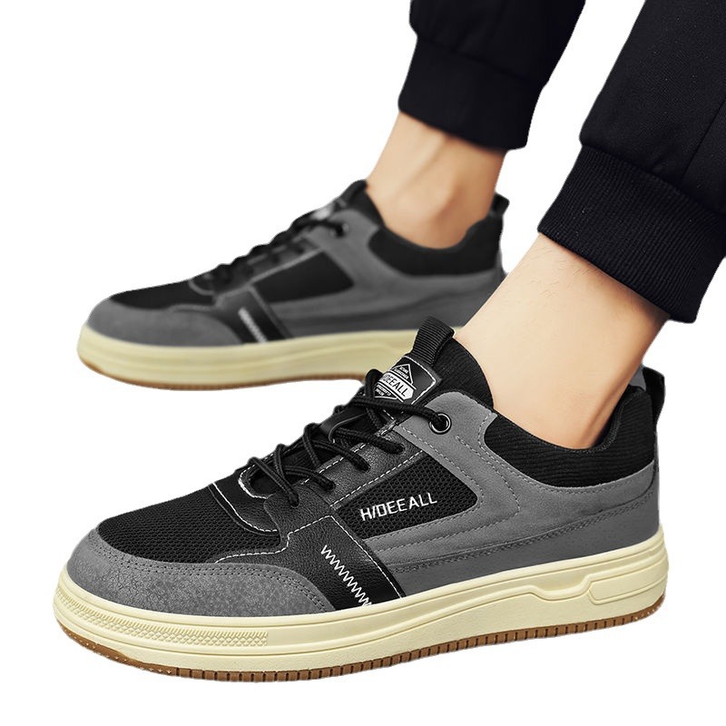 Zapatos de hombre invierno 2026 nuevo estilo ventilado puerto viento versátil anti-sucio zapatos de malla de moda ligero con suela suave zapatos deportivos casuales