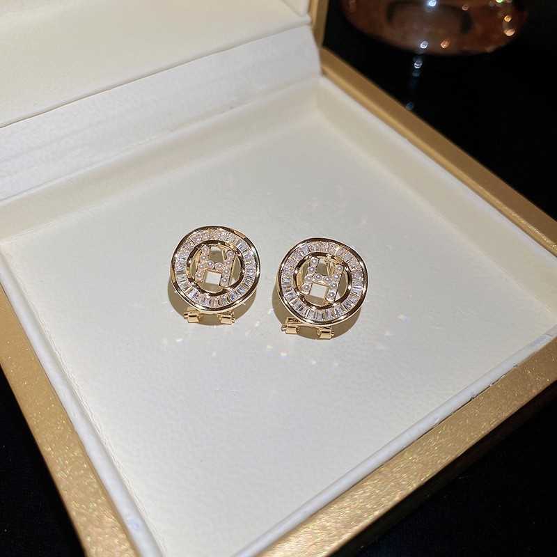 Pendientes de perlas de flor de circón de aguja de plata, pendientes de lujo de alta gama de lujo ligero exquisito, pendientes de todo fósforo blanco de moda de nicho al por mayor