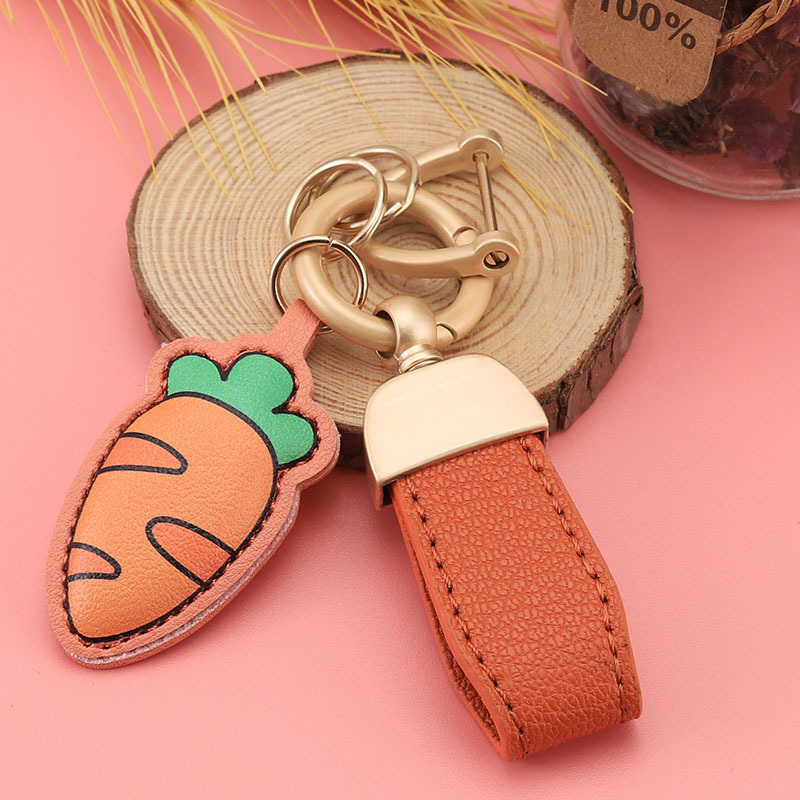 Nuevo llavero de piel de cordero francés pequeño llavero fresco colgante mini bolso corto colgante pequeño joyería