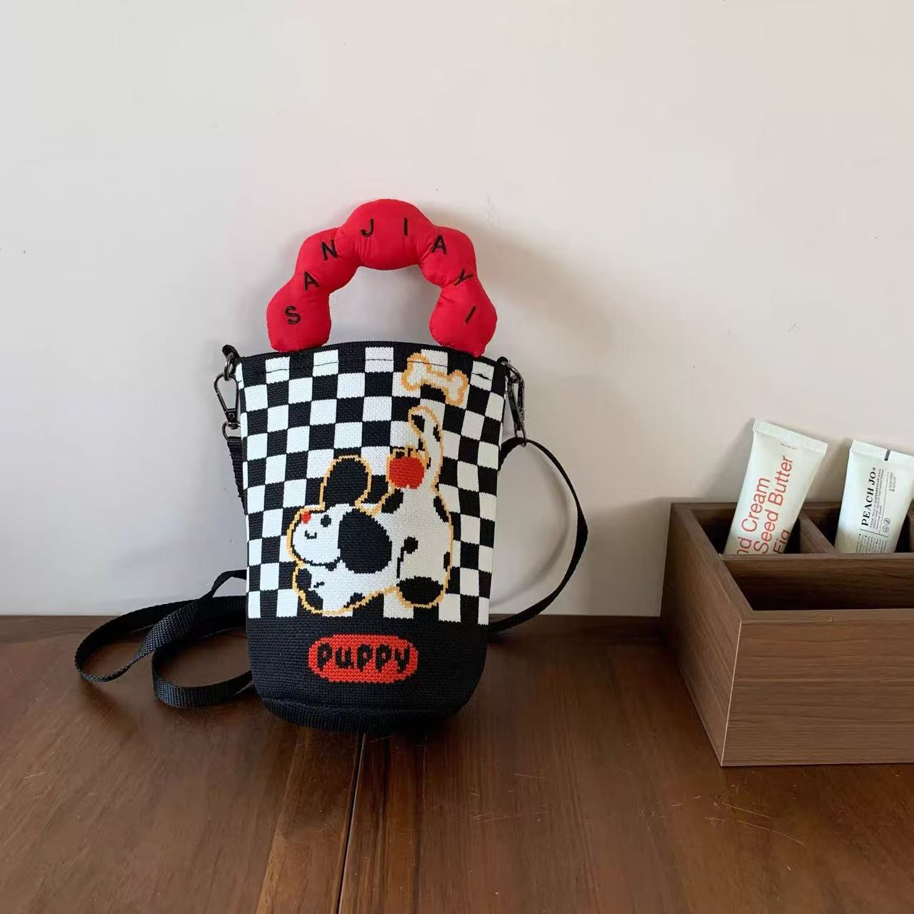 2026 primavera y verano nuevo bolso de cubo de pintura creativo portátil gran espacio de aire de dopamina alta sensación mochila