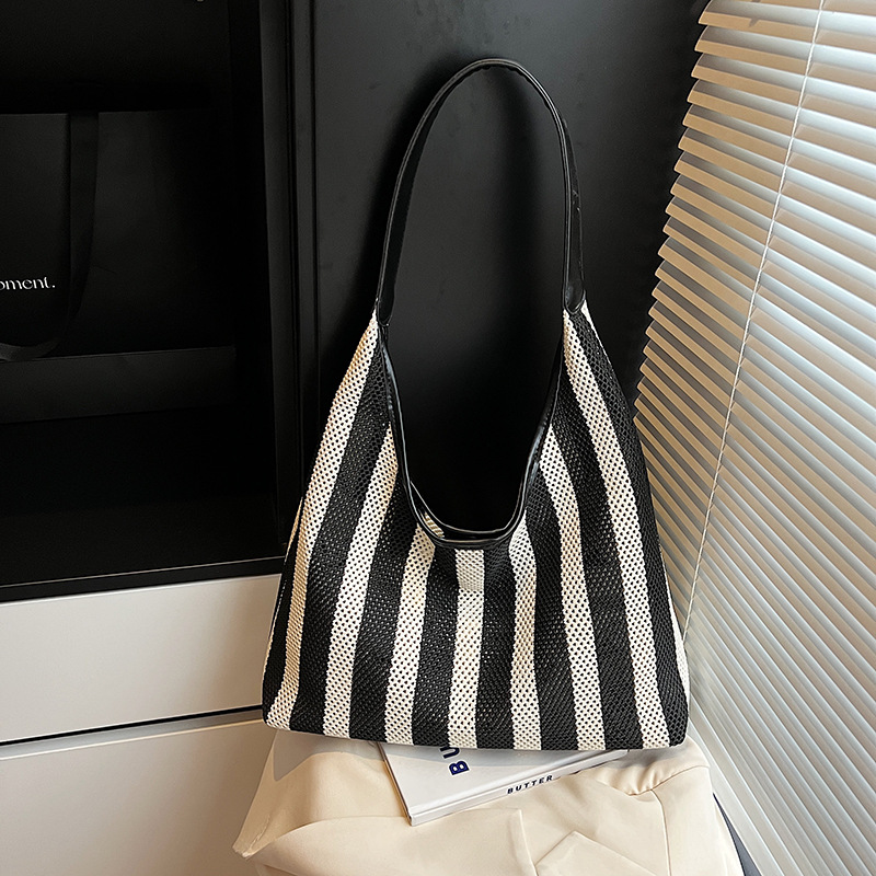Bolso Tote de moda coreana 2025 nuevo bolso de mujer tejido casual bolso de estilo perezoso bolso de hombro a rayas en contraste