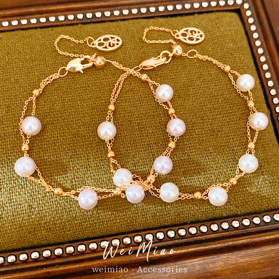 18k oro real chapado perlas de doble capa cruzada pulsera de extracción ligera pulsera de nicho de lujo personalidad joyas de mano mujer