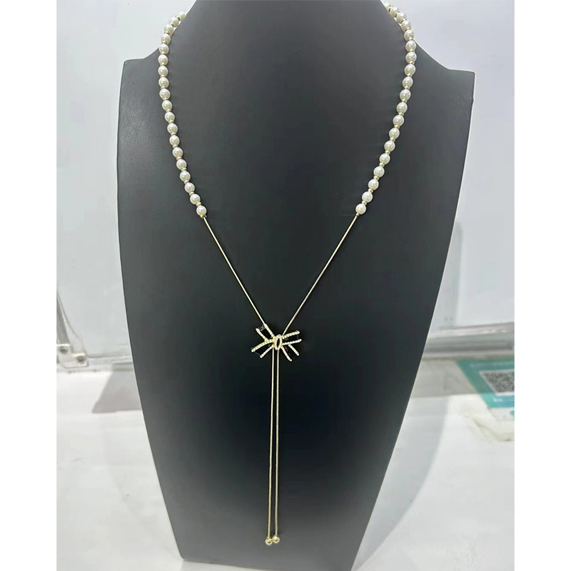 Collier de perles à tirer pour femme, chaîne ras du cou à pompon papillon haut de gamme et polyvalente, chaîne tendance unique pour pull_voghion.com