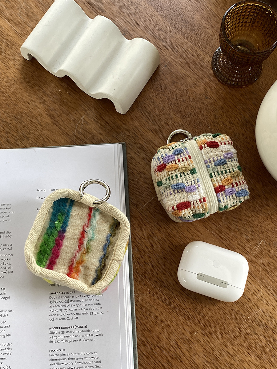 ブルートゥースのイヤホンのカバンのデータ線のミニのキーホルダーの収納袋の小銭入れのイヤホンの保護カバー