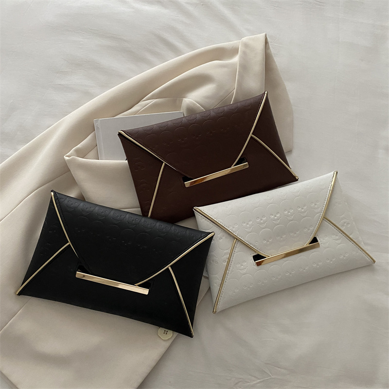 Bolsa de sobres de textura retro para mujeres 2024 otoño y invierno nuevo bolso de mano de mujer bolso de ocio de estilo extranjero bolso pequeño