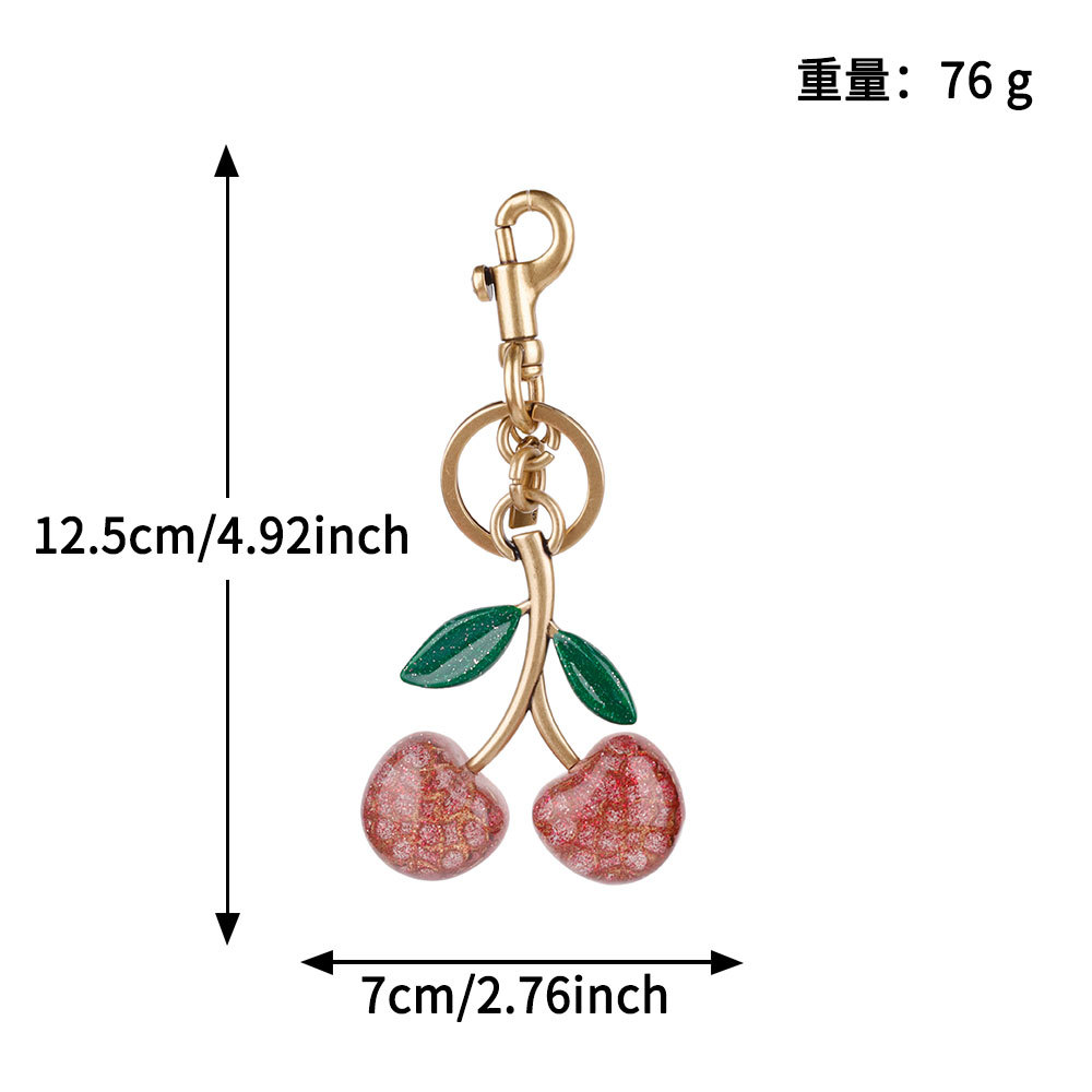 Transfronterizos directamente para bolsas de cereza colgantes de moda llaveras de automóviles llaveras de Amazon llaveras de metal accesorios de bolsas al por mayor