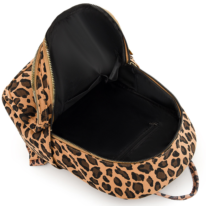 Mochila transfronteriza con estampado de leopardo súper fuego para mujer 2024 nuevo estilo salvaje para mujer mochila casual de gran capacidad bolso de viaje de moda