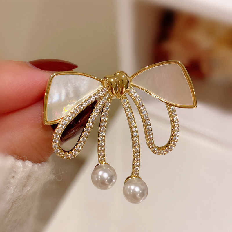 Bow Anti-running Light Brooch Women's High-end Sense High-end French Retro Corsage Elegant Elegant Anti-running Light Buckle Pin