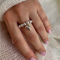 ステンレスの小さい衆の幾何学の桃の心の指輪の輸入の弾力性の縄の高級な個性の百合の手作りの数珠のDIYの指輪