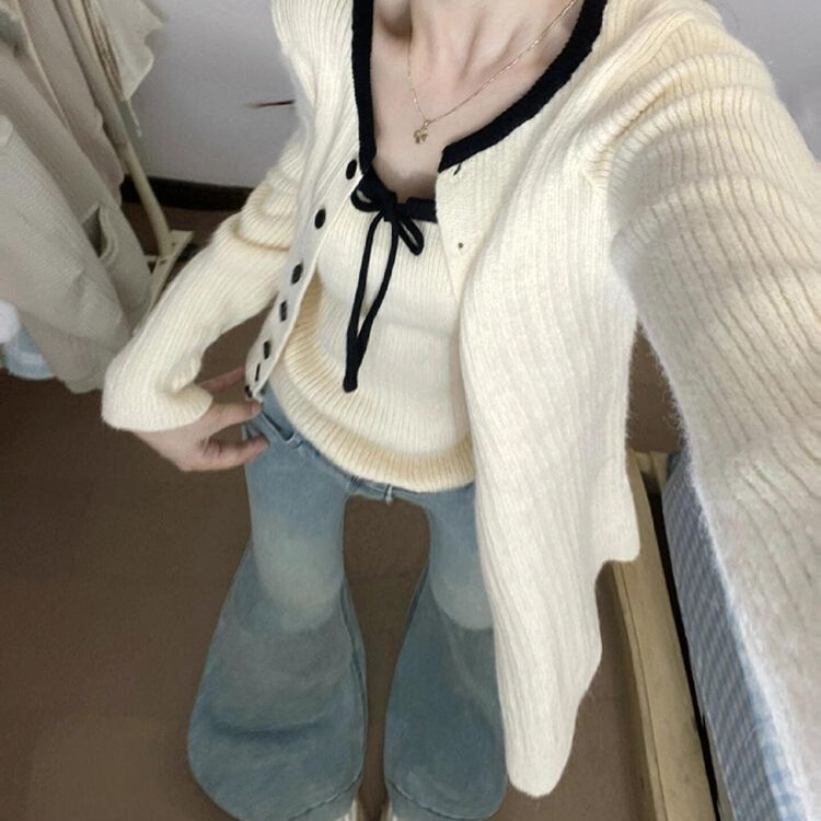 Knitted cardigan for women, featuring a delicate bow detail, a slim-fit design, and a new two-piece set. Sweet and stylish for autumn, with a drawstring and a soft, Korean-inspired design